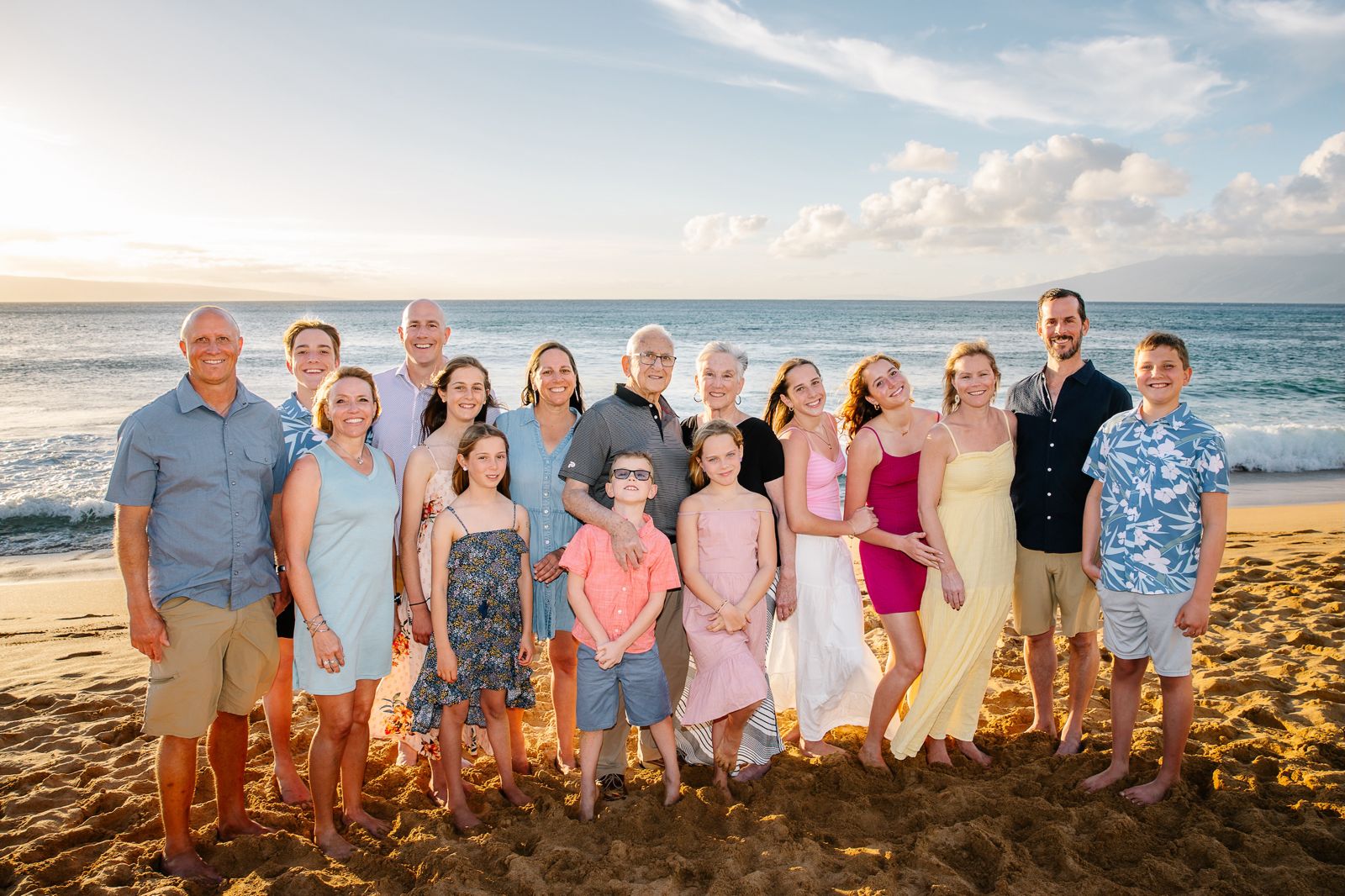 Extended family at sunset on the beach