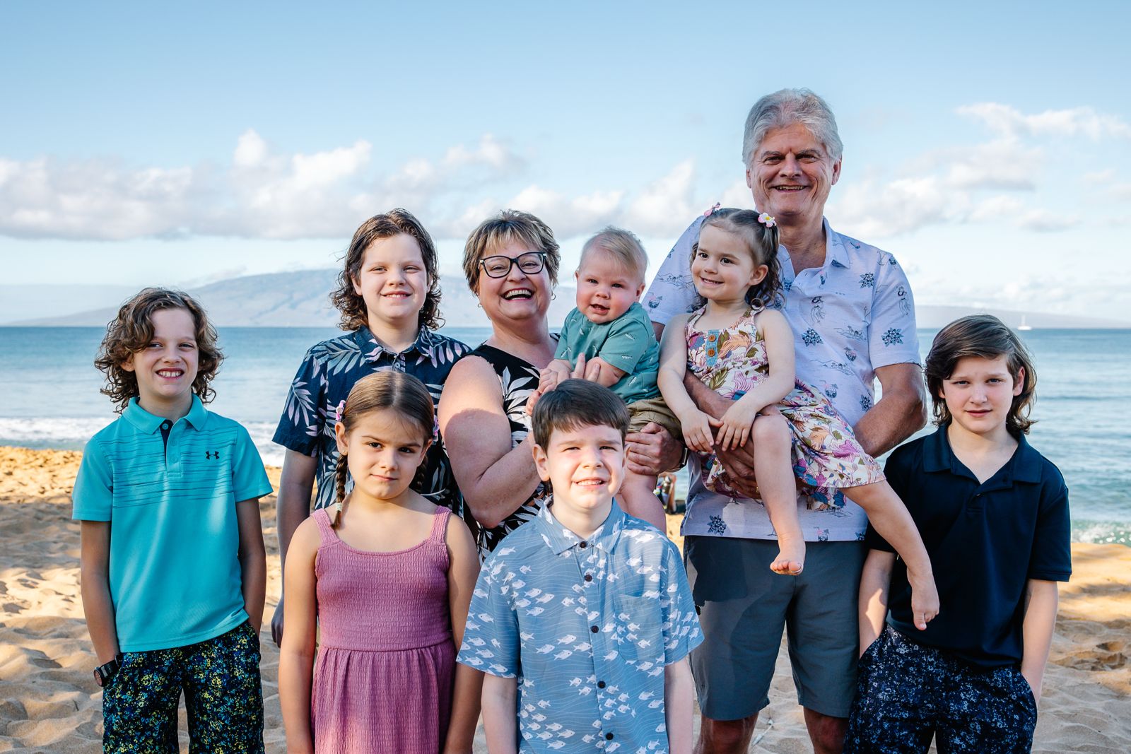 Grandparents with grandchildren on Maui beach