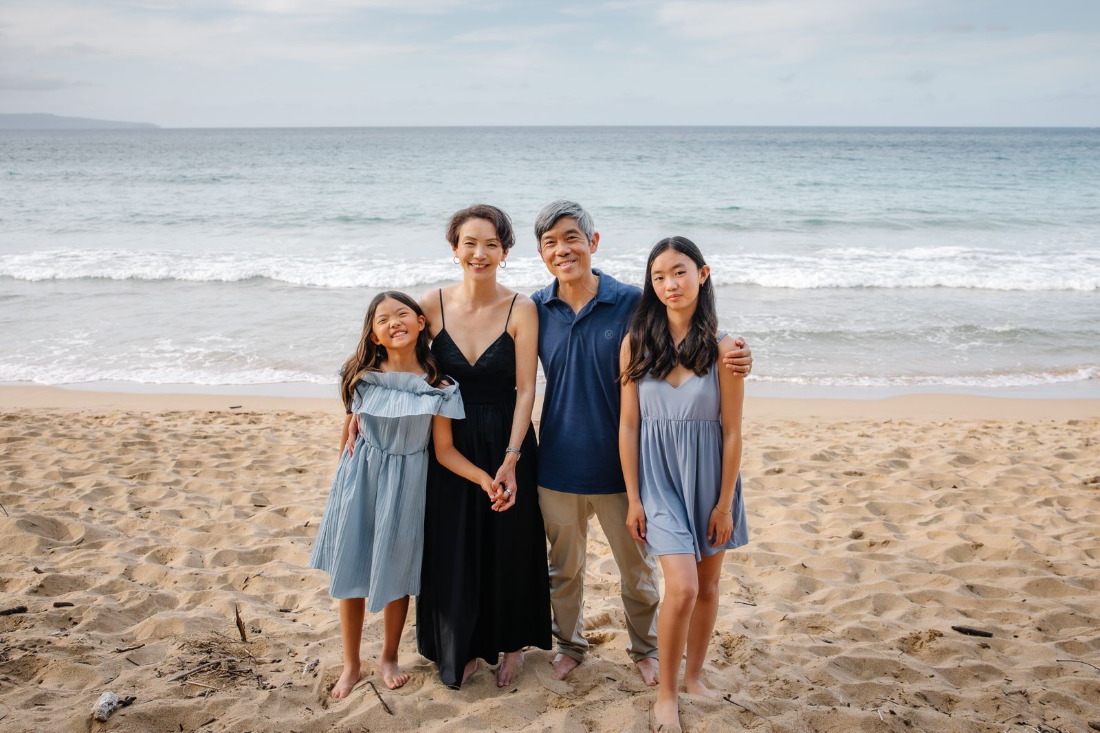 Family of four on Maui beach